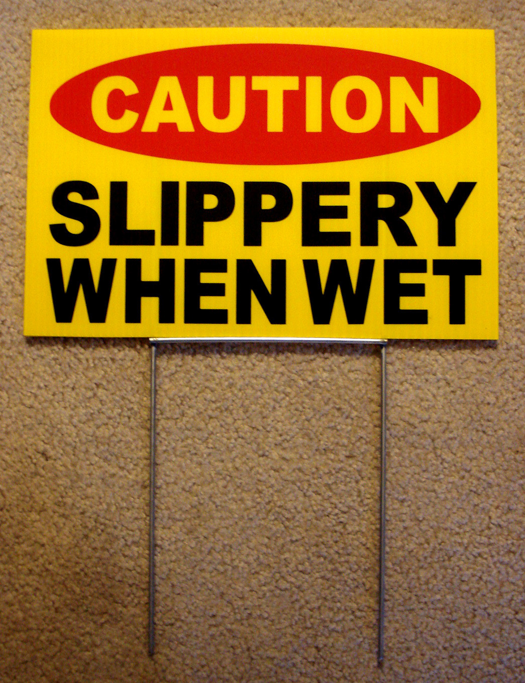 CAUTION – SLIPPERY WHEN WET 8″ x12″ Plastic Coroplast Sign with Stake