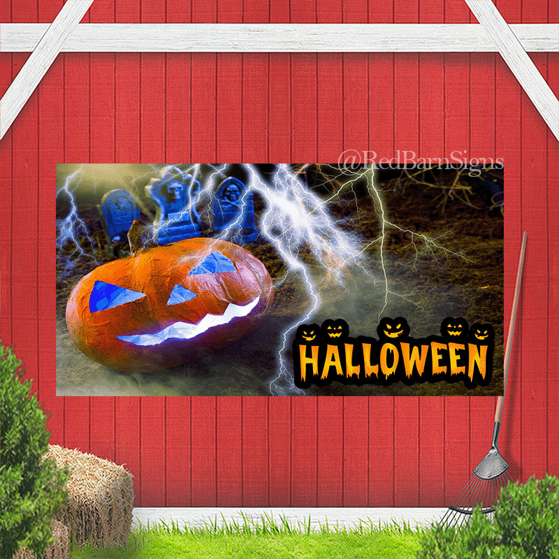 Orange handmade pumpkin with carved face in Halloween style with lightning and h