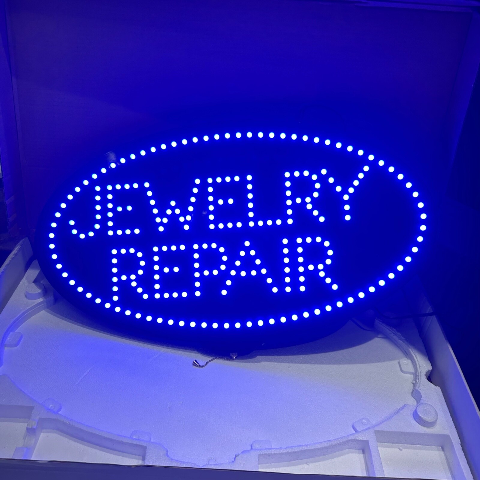 Jewelry Repair Black Blue LED Window Sign Oval Indoor Use Only 15in by 27in