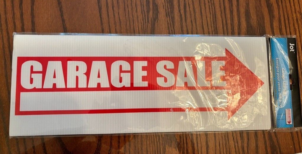 Garage Sale sign, 6 x 16 new in a plastic bag, never used. It comes with holders