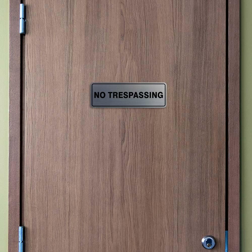 Standard No Trespassing Sign – Black / Gold – Small 2″ X 6″
