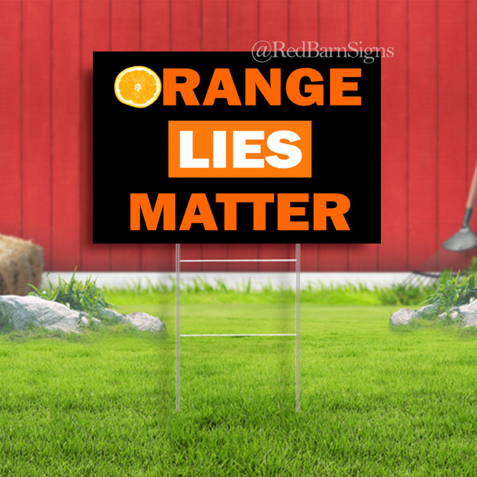 Orange Lies Matter protest yard sign with metal stakes
