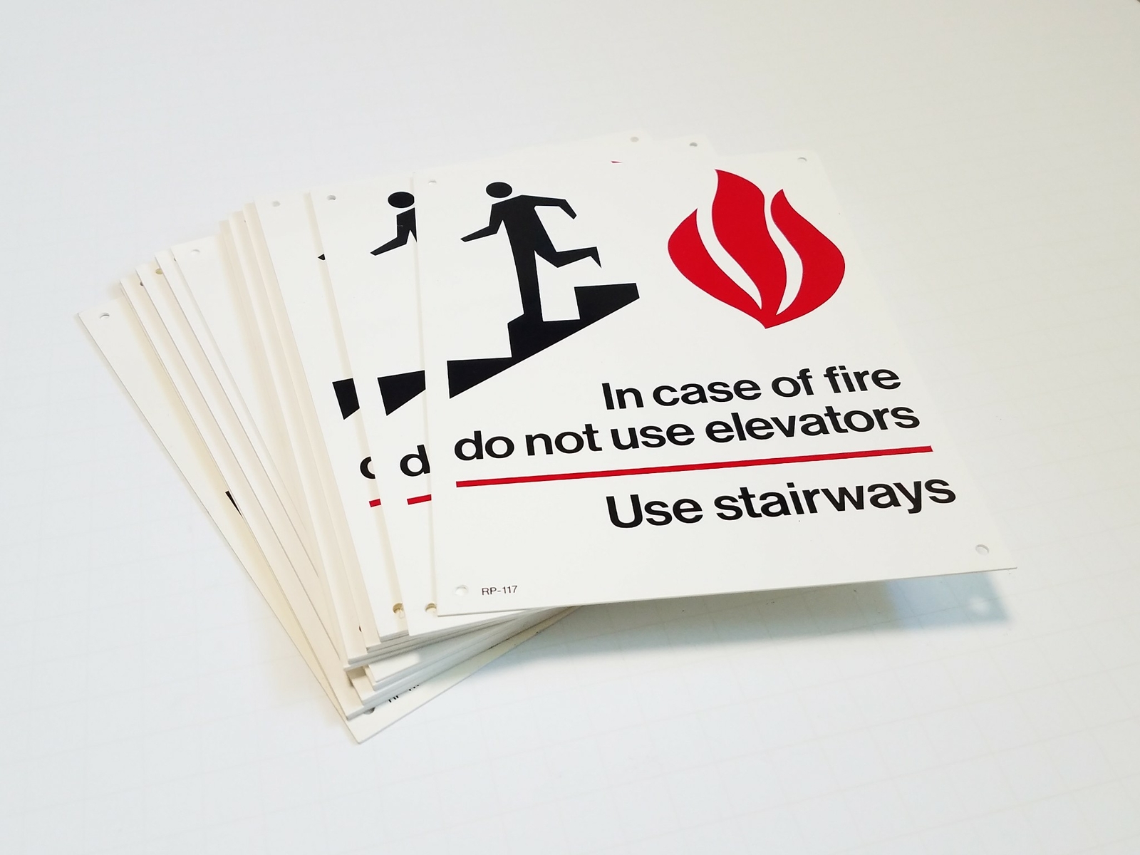 Lot of (25) New 5-1/2″ x 7″ In case of fire do not use elevators – Use stairways