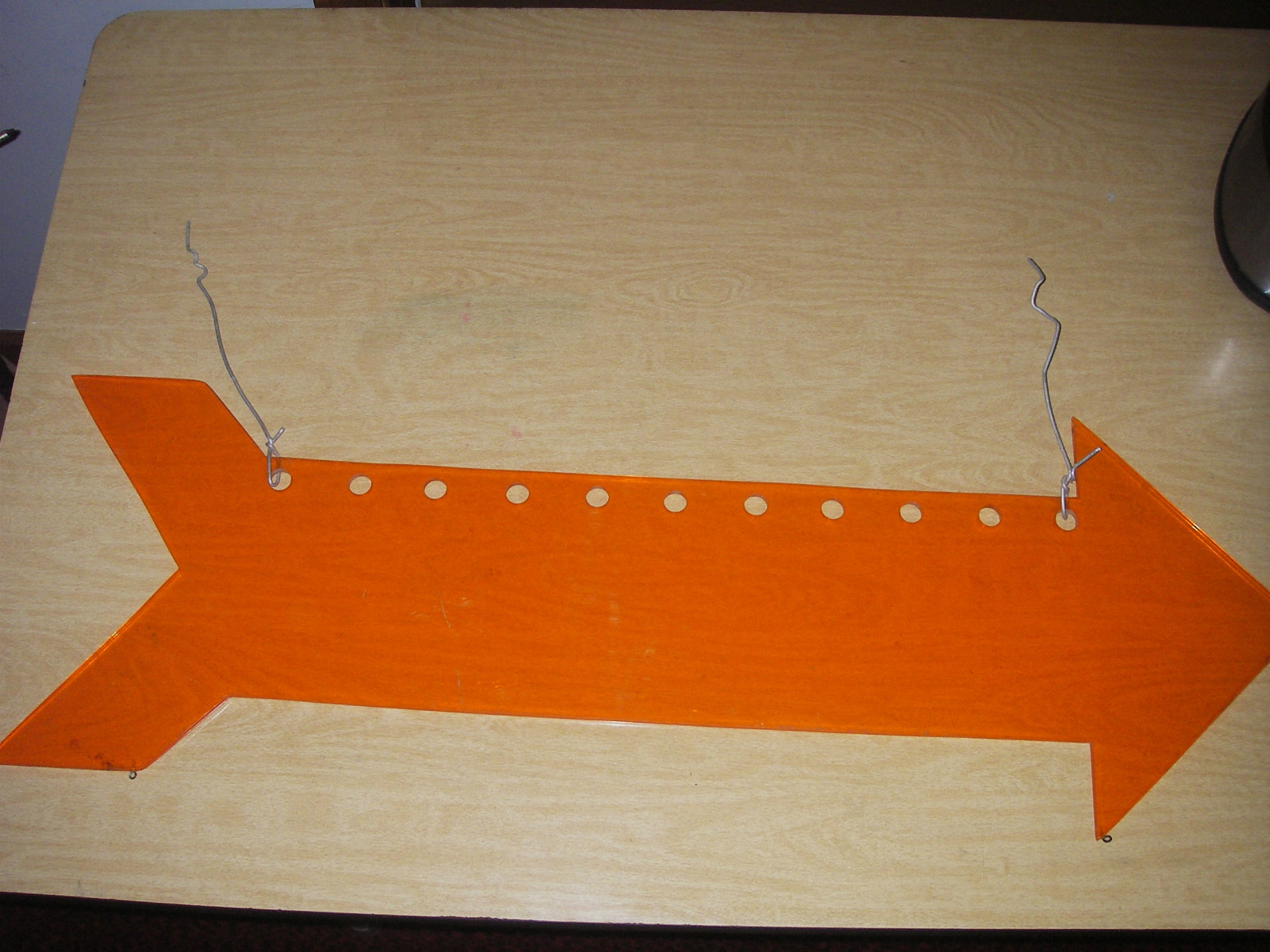 LARGE ACRYLIC ORANGE ARROW HANGING SIGN PREOWNED