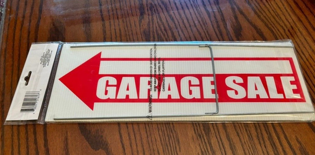 Garage Sale sign, 6 x 16 new in a plastic bag, never used. It comes with holders