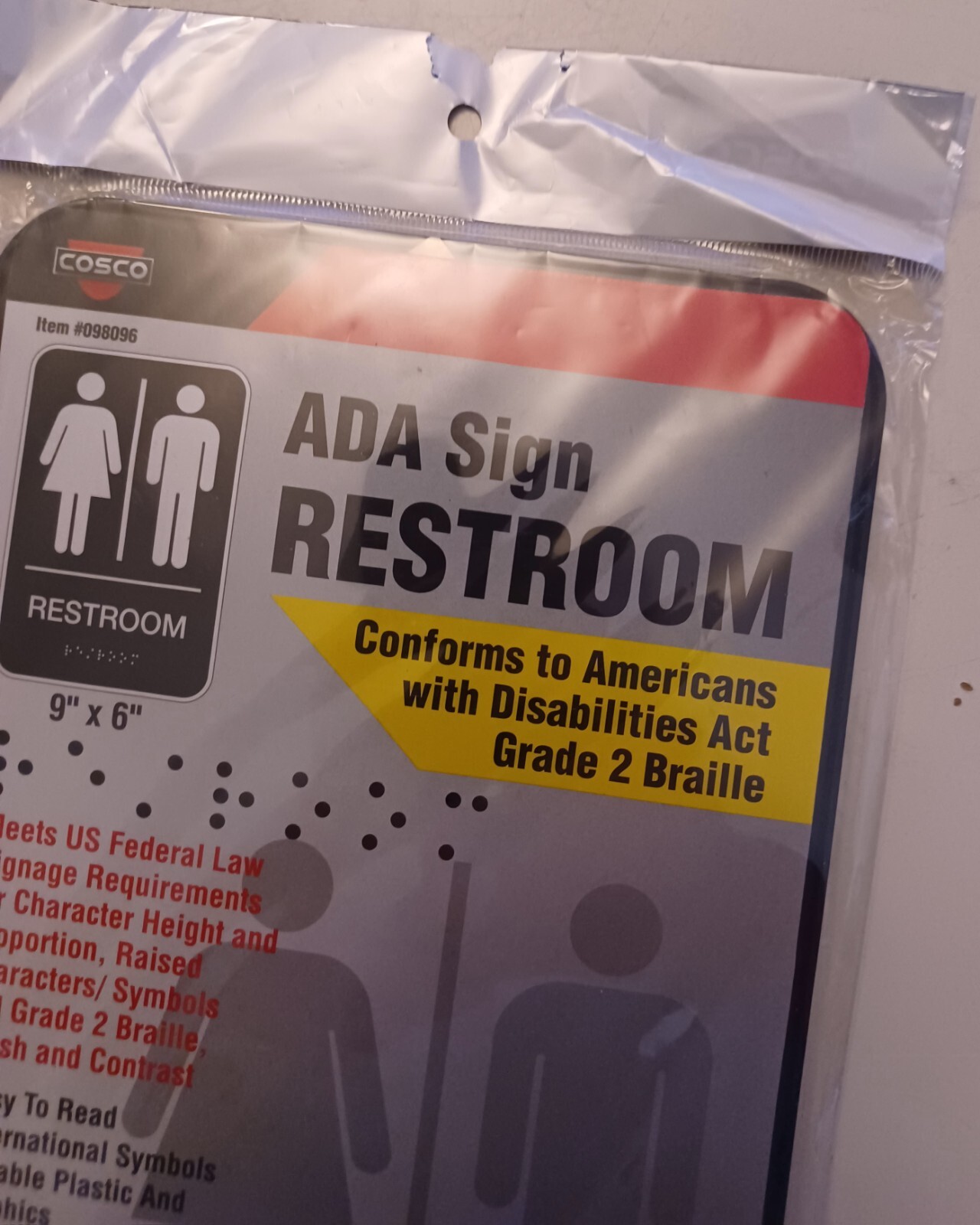 Cosco ADA RESTROOM Self Adhesive Sign with Braille 9″ X 6″