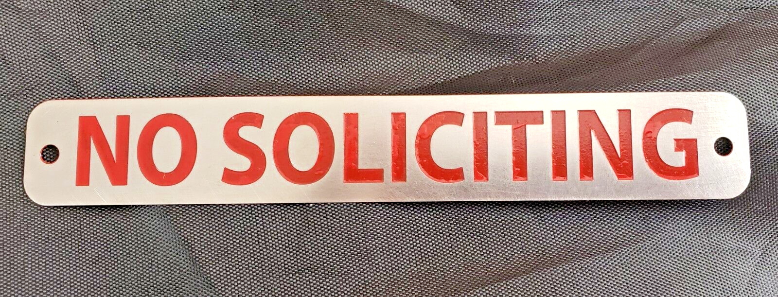 NO SOLICITING RED Sign Stainless 5.7″ x 0.7″ x 0.010″ thickness Made in USA