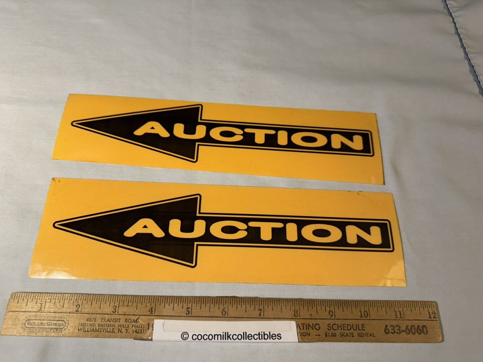 Lot of 2 Vinyl or Plastic Coat Auction Arrow Signs Yellow in Color 3 x 11 “size