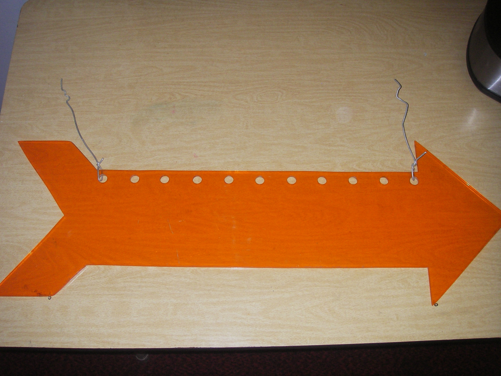 LARGE ACRYLIC ORANGE ARROW HANGING SIGN PREOWNED