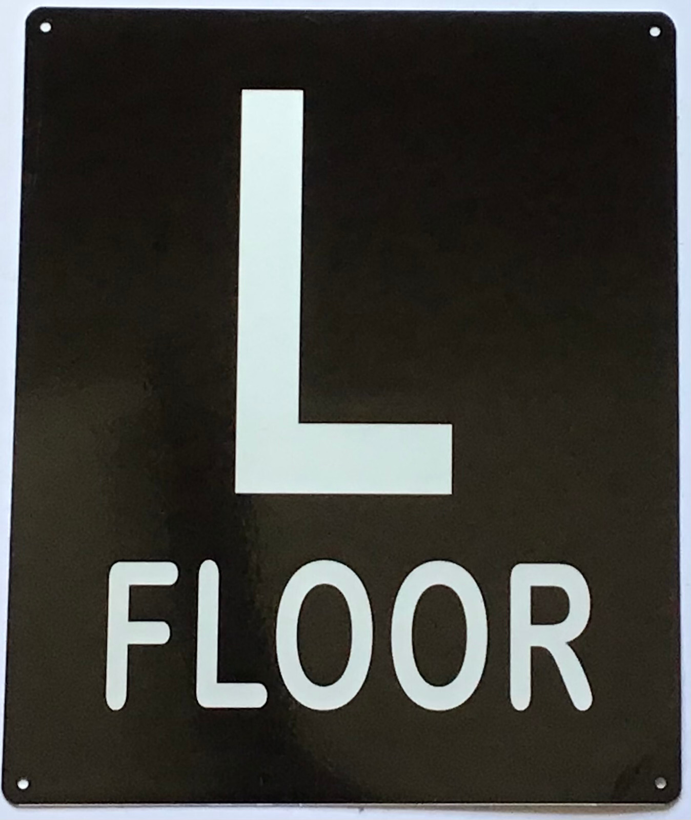 L FLOOR SIGN (10X12, Black Background, Aluminum)