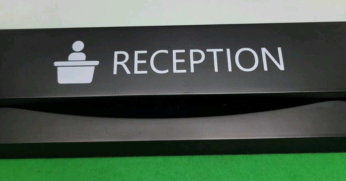 Heavy 16.5″ Solid Resin Reception Desk Sign – Sturdy Slanted Name & Icon