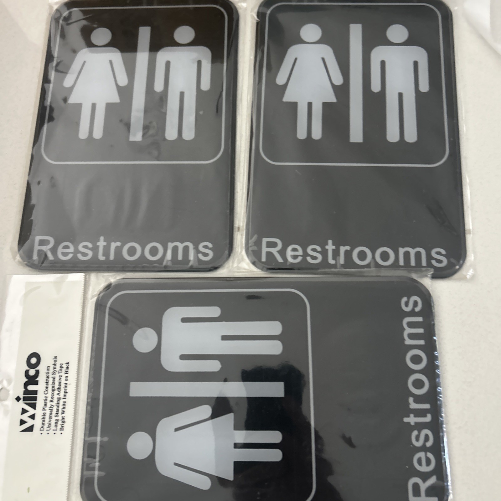 3 Winco Unisex Male, Female Restroom sign Black Plastic Adhesive