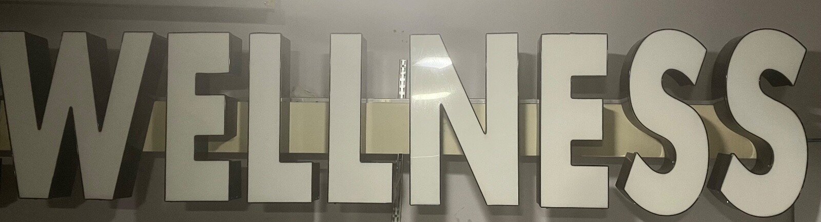 This Lite Commercial business sign 9 ft long by 1 ft 11 1/2 inches wide. Wired
