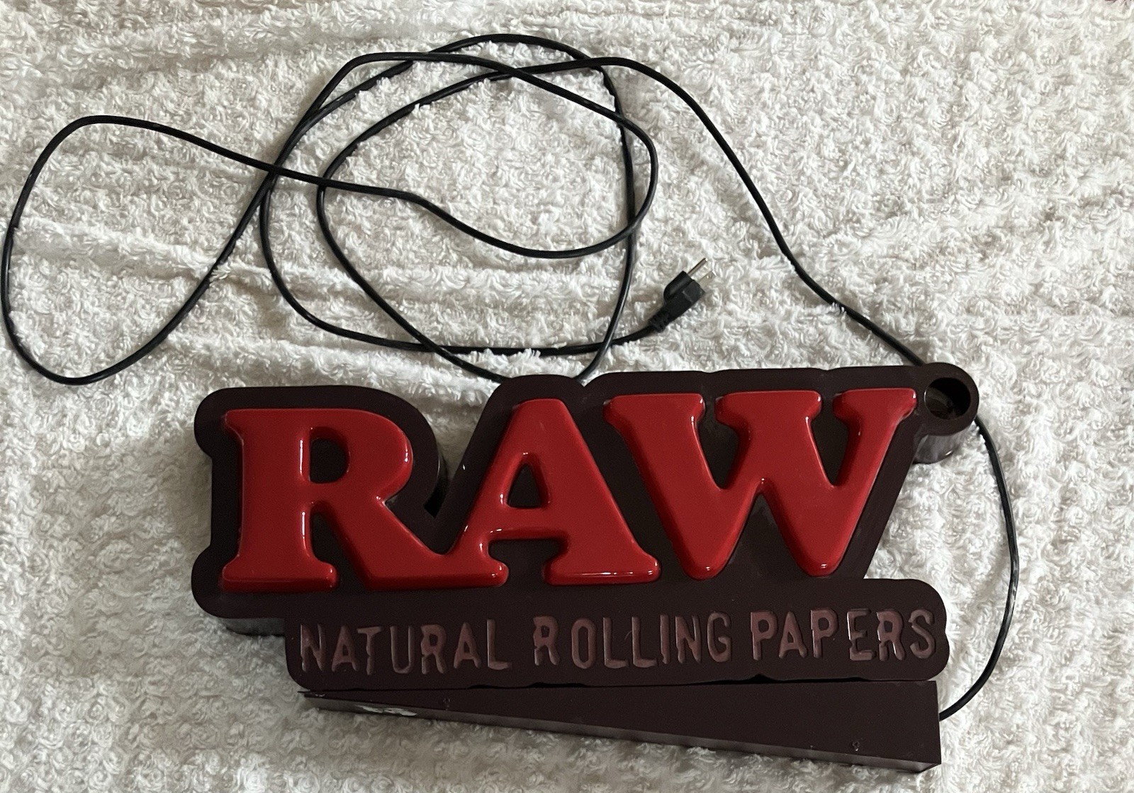 RAW LED LIGHTED SIGN. About 24 X 12 X 2.5