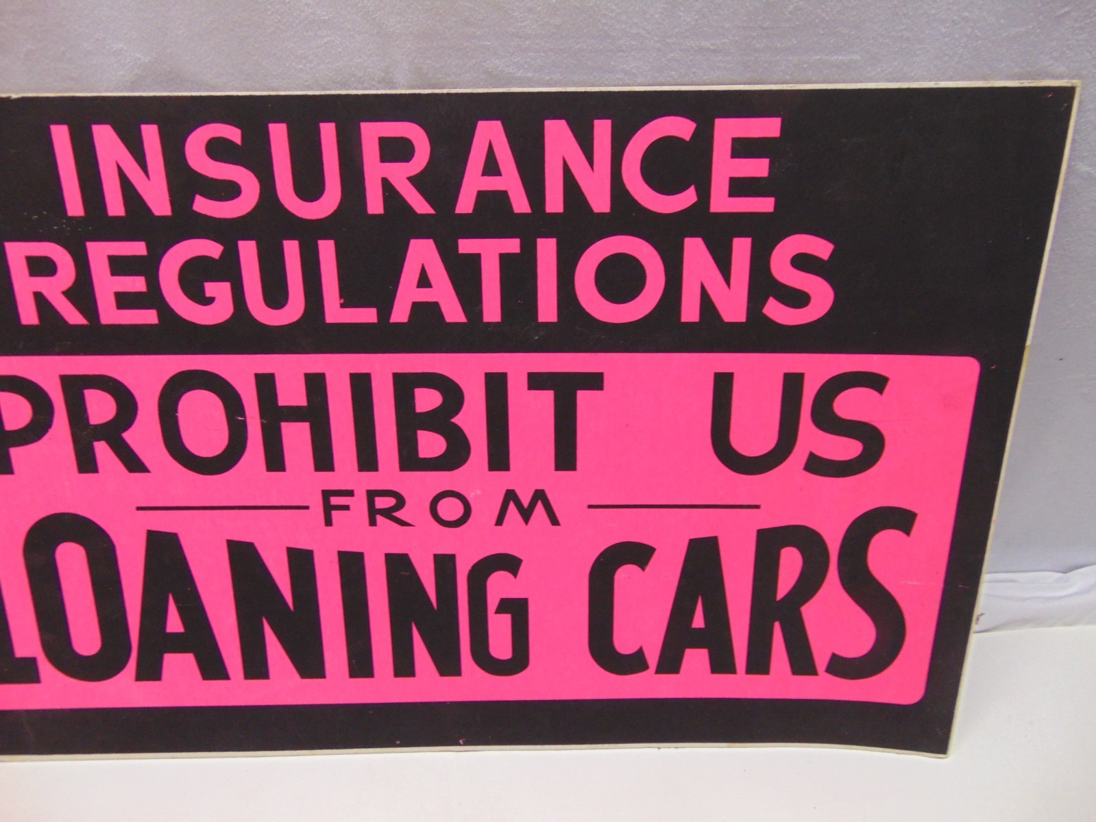Vintage unused Neon Purple & Black Insurance cardboard display sign 22″ x 14″