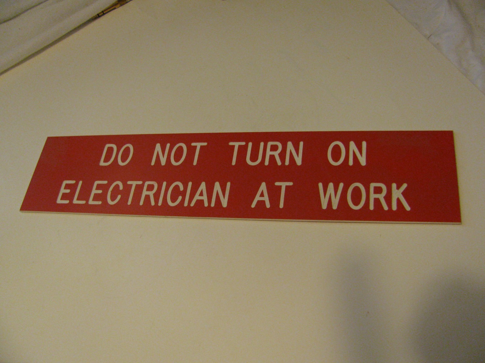 Maintenance Electric Division Warning Sign: ‘Do Not Turn on Electrician at Work’