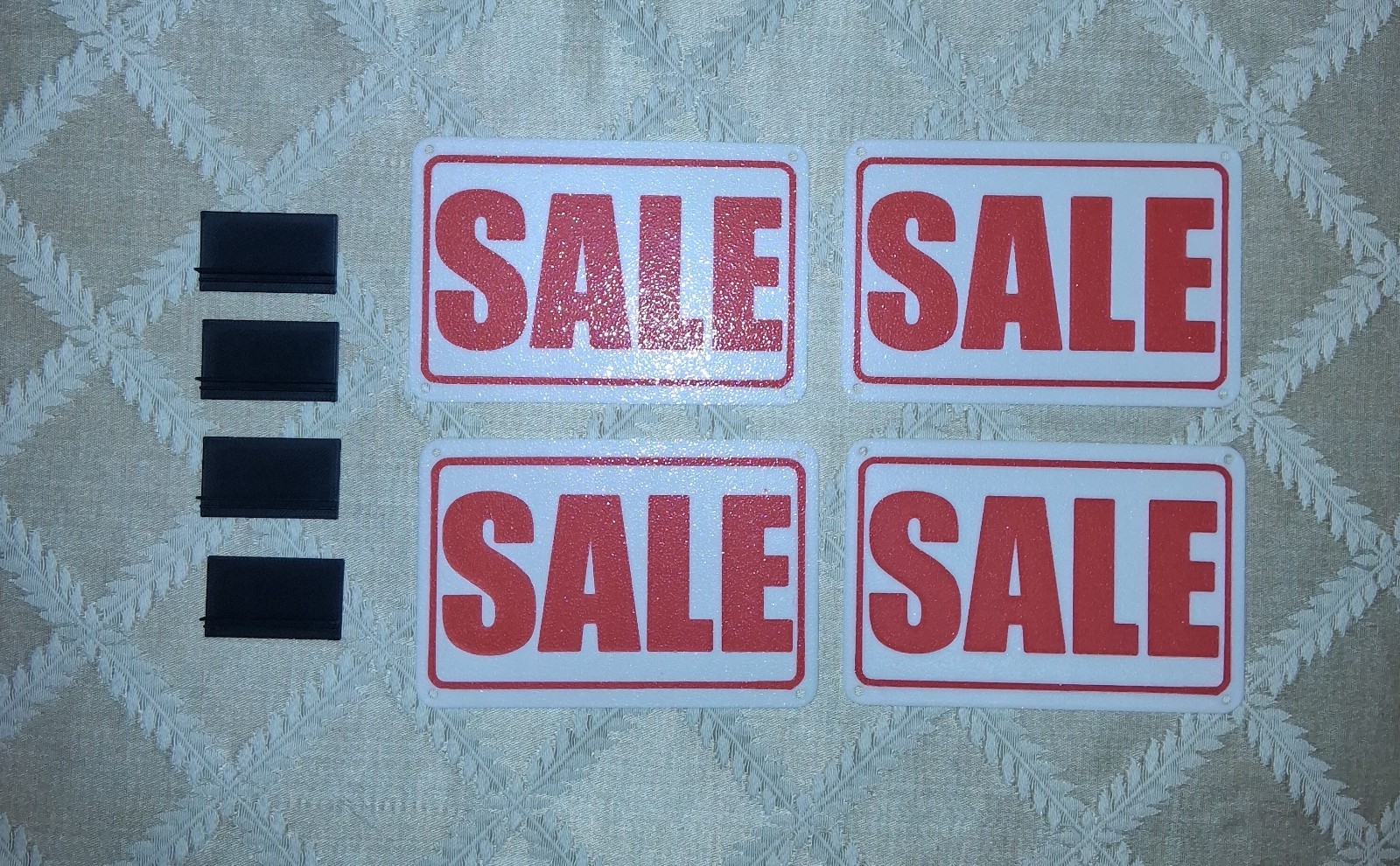 4 pack of “SALE” Mini Signs with Stands. Great Shelf Display for Sales.