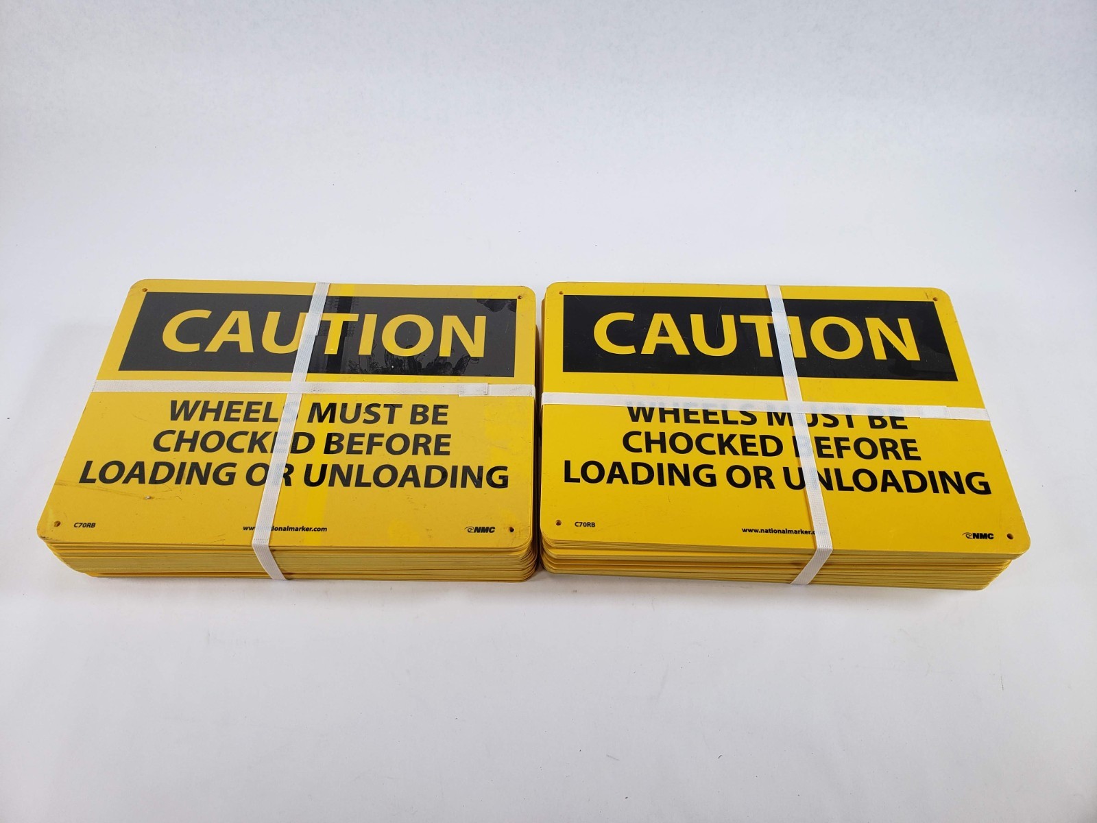 Lot of 100 OSHA Caution Signs – WHEELS MUST BE CHOKED BEFORE LOADING Made in USA