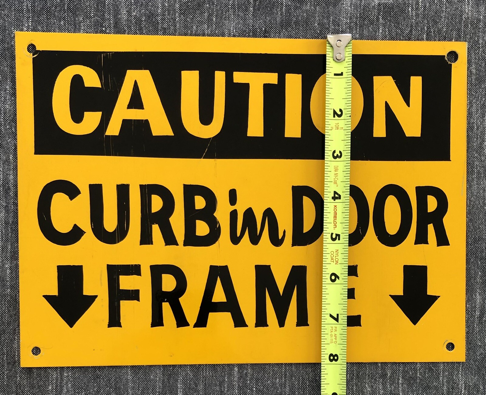 “Caution Curb In Door Frame” 11”x8” Metal Sign