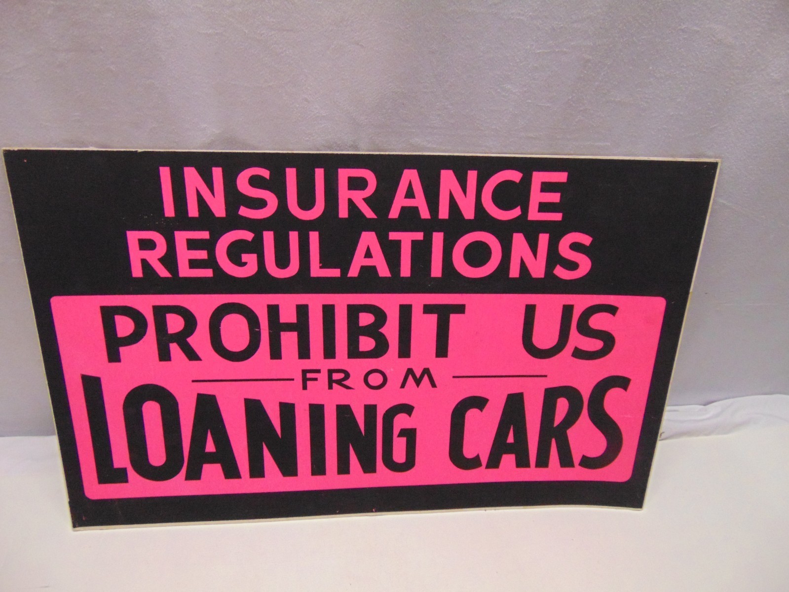 Vintage unused Neon Purple & Black Insurance cardboard display sign 22″ x 14″